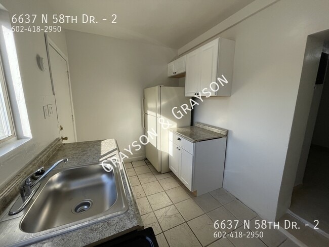 Photo - 6637 N 58th Dr Apartment
