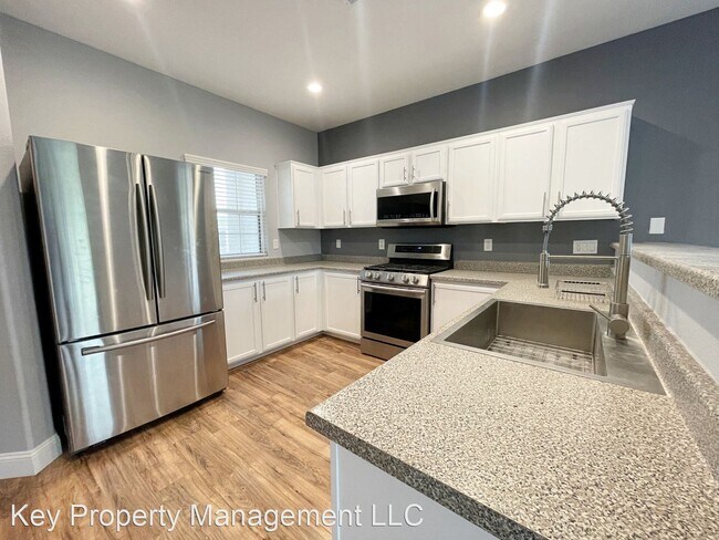 Foto del edificio - 4 br, 2.5 bath House - 2825 Woodland Park Ave