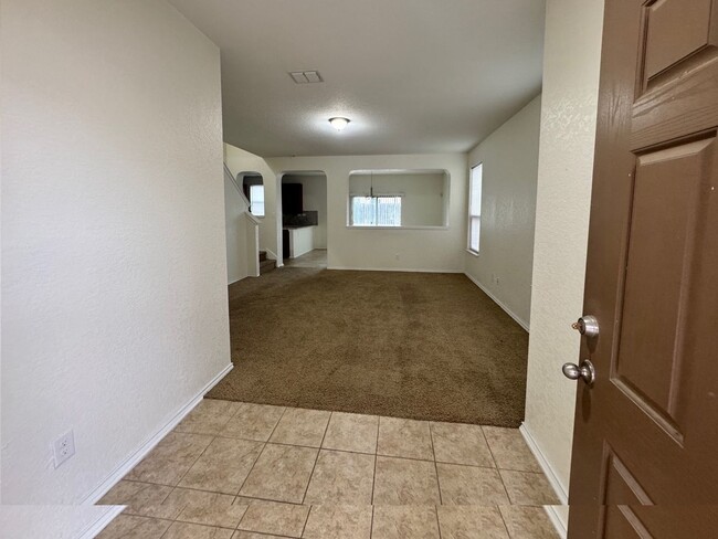 Building Photo - A Must See! Spacious 3/2.5 Home in SW SA -...