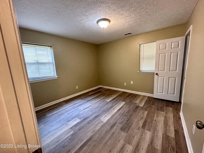 Building Photo - 8908 Blue Bell Dr