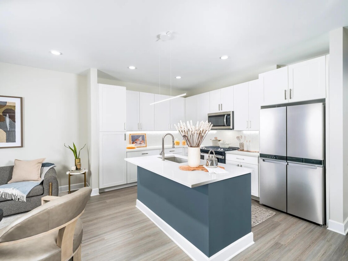 Unleash your inner chef at Modera Waugh! Enjoy a spacious chef's island with ample storage and an ENERGY STAR® stainless-steel appliance package, perfect for culinary creations. - Modera Waugh