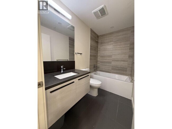 Photo du bâtiment - 6383 McKay Ave