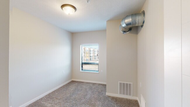 Bedroom - PowderHaus Apartments & Townhomes