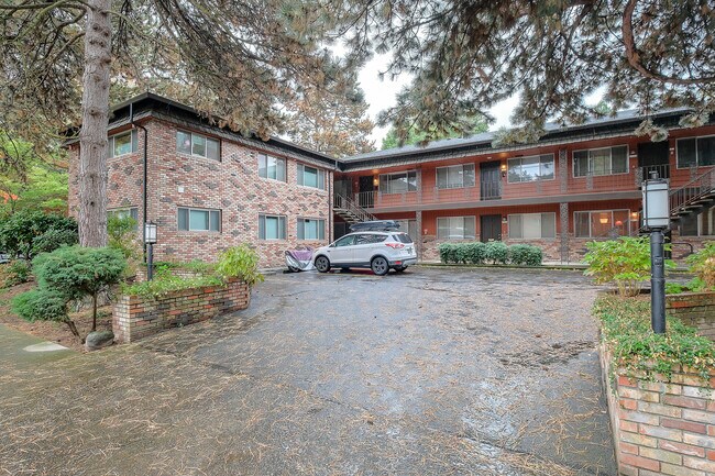 Assigned parking spot is steps from your front door. - 2038 NE Hancock St