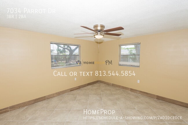 Building Photo - 7034 Parrot Dr