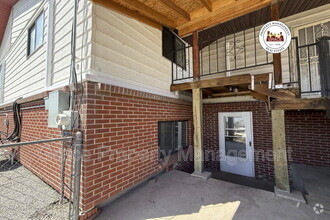 Building Photo - 1149 E 58th Ave