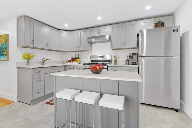 Kitchen, Virtually Staged. - 32A Buffalo Ave