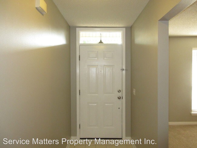 Building Photo - 4 br, 3 bath House - 5400 Woodsman Drive