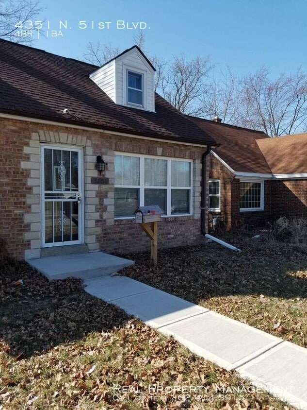 Primary Photo - Brick Cape Cod Home