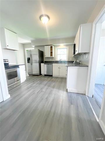 Foto del edificio - 214 E 3rd St