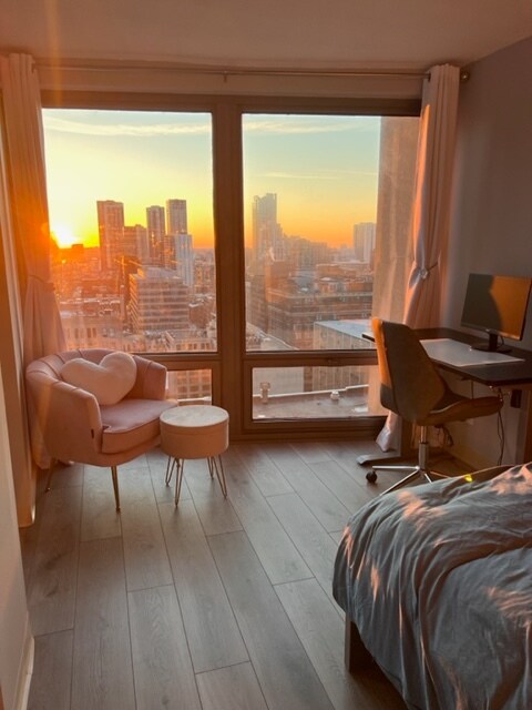 Magnífica vista del atardecer desde el dormitorio - 440 N Wabash Ave
