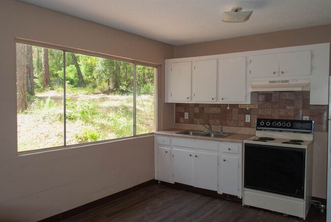 Photo - 1 Bed  1 Bath Townhouse For Rent