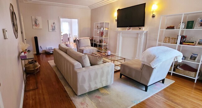 Living room with fireplace mantle - 1003 S Holt Ave
