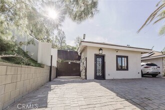 Building Photo - 12809 Woodley Ave