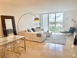 Building Photo - 10275 Collins Ave