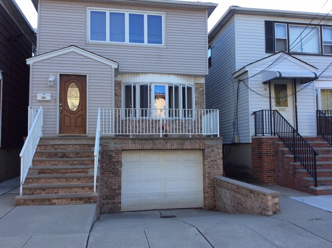 Front of House with Sun Porch - 30 E 36th St