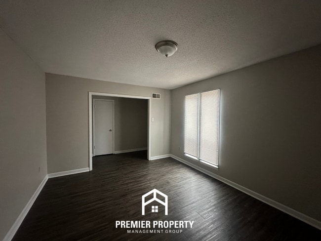 Photo - Charming 3BR Memphis Home | Rustic Brick Fireplace, Formal Dining & Fenced Backyard