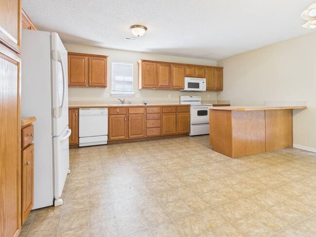 Building Photo - 703 Iron Horse Dr