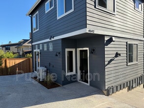 Building Photo - 4142 3rd Ave NW