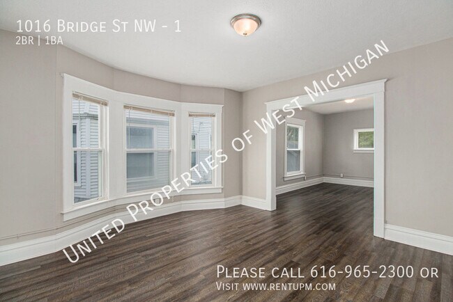 Building Photo - Pre Lease | Available 7/21/25 | Cozy 2 Bed...