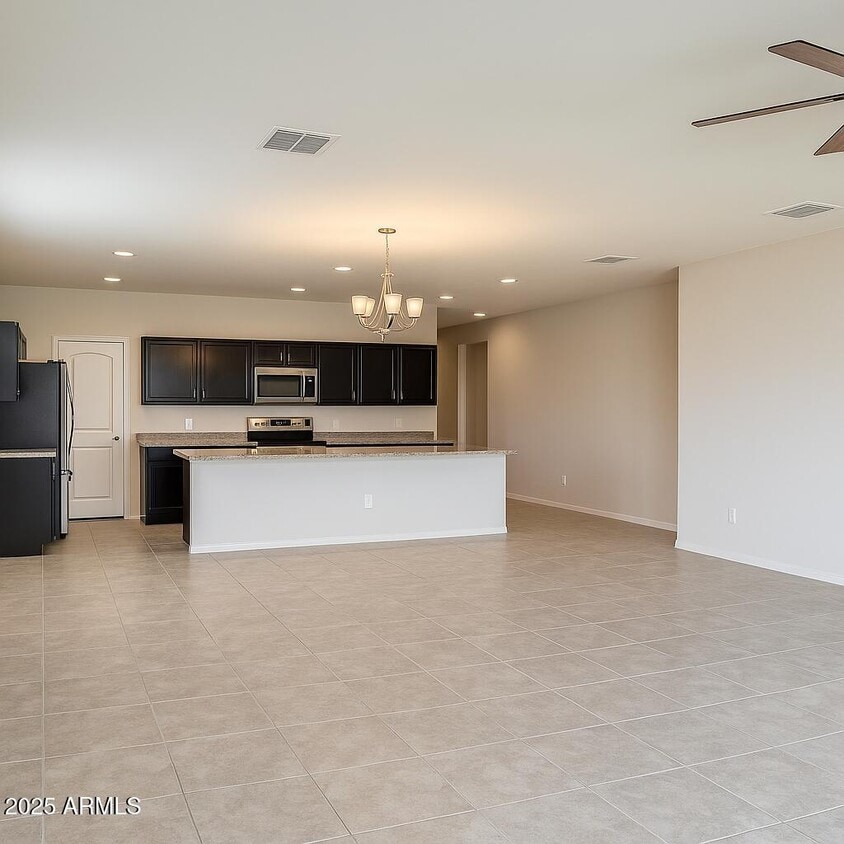Building Photo - 25698 W Desert Dr
