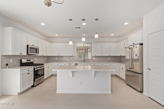 Building Photo - 3813 N 100th Dr