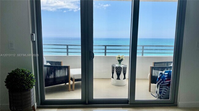 Building Photo - 5555 Collins Ave