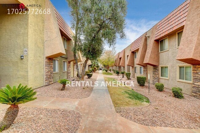 Building Photo - COZY first floor condo in GUARD GATED COMM...