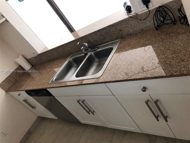 Building Photo - 117 NW 42nd Avenue 1603, Miami, FL 33126