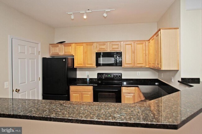 Building Photo - 1600 Spring Gate Dr.
