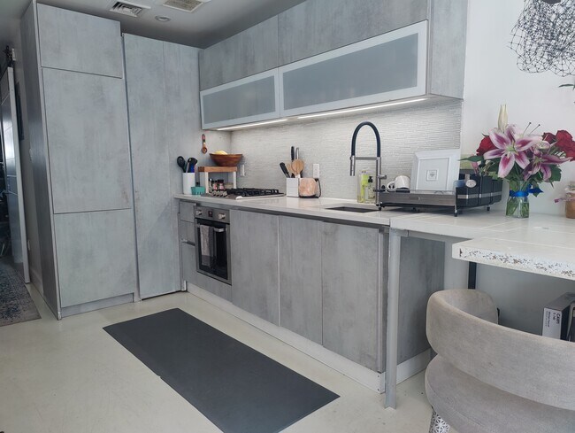 Kitchen with hidden appliances - 668 Halsey St