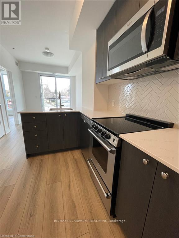 Photo principale - 312-312 Erb St. W