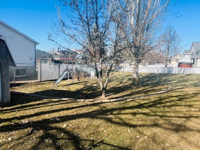 Building Photo - Beautiful remodeled home with fenced backyard and 2 car garage