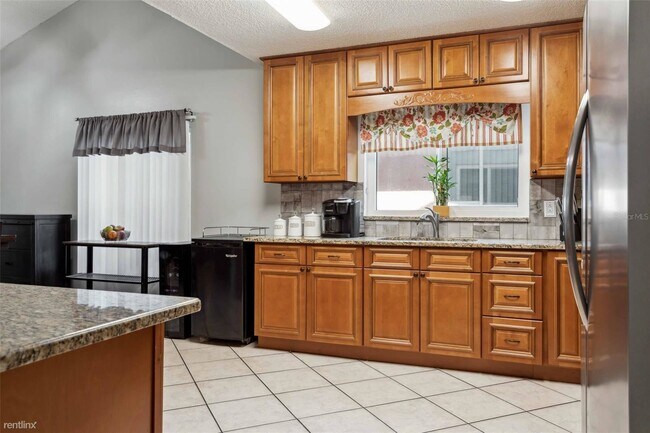 Building Photo - 5 br, 2 bath House - 6704 Mirror Lake Avenue