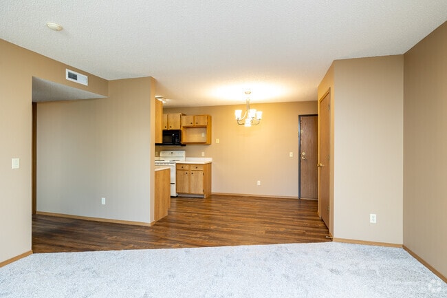2BR, 1BA - 1,030SF - Living Room/Dining Room - Chapelwood III Apartments