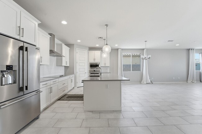 Building Photo - Modern Surprise Home with 3-Car Garage and Designer Upgrades