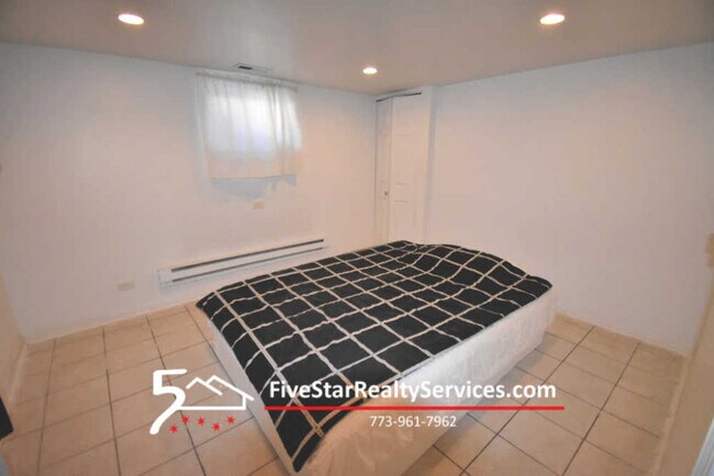 Foto del edificio - 4034 N Lowell Ave