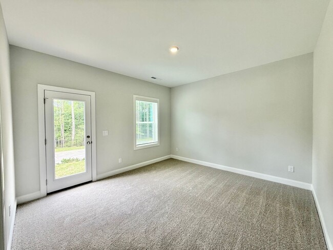 Building Photo - Stunning End Unit New Construction 3BD, 3....