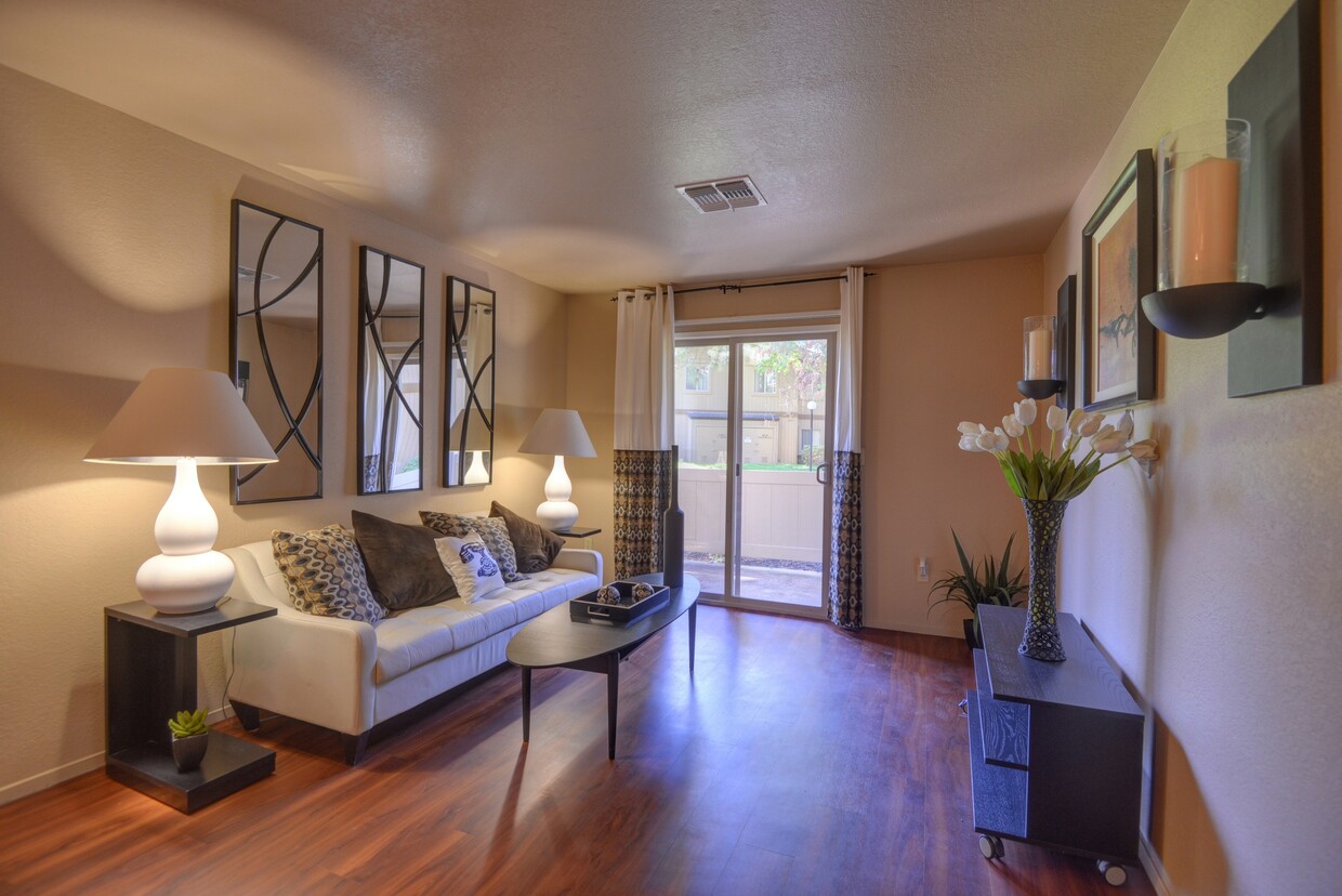 Living Room with Patio Door - Arborelle Apartments