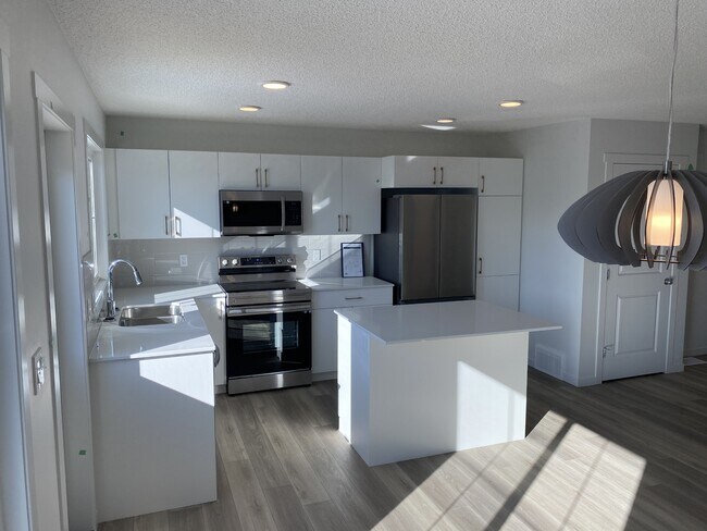 Photo du bâtiment - 13119-13209 13119 209 St NW