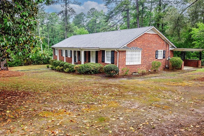 Building Photo - Sizable ranch home with finished basement