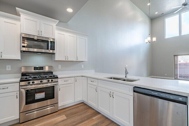 Building Photo - BRAND NEW HURRICANE TOWNHOME - END UNIT