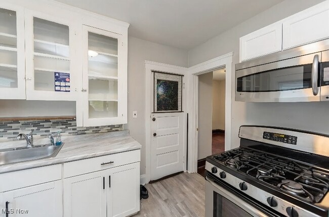 Building Photo - 10310 Adelaide Ave