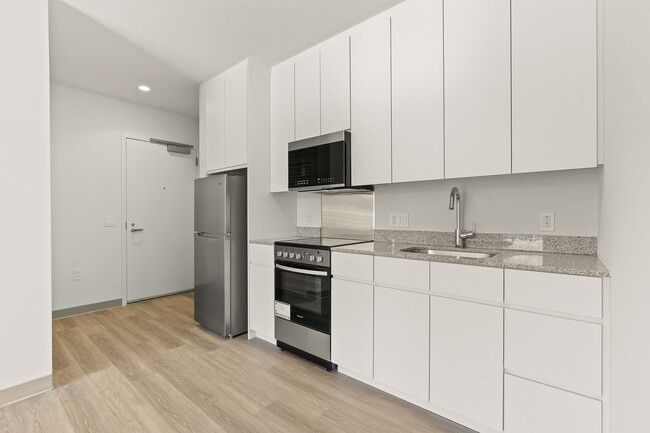 Building Photo - Brand New 2-bedroom, 1-bathroom at The Fla...
