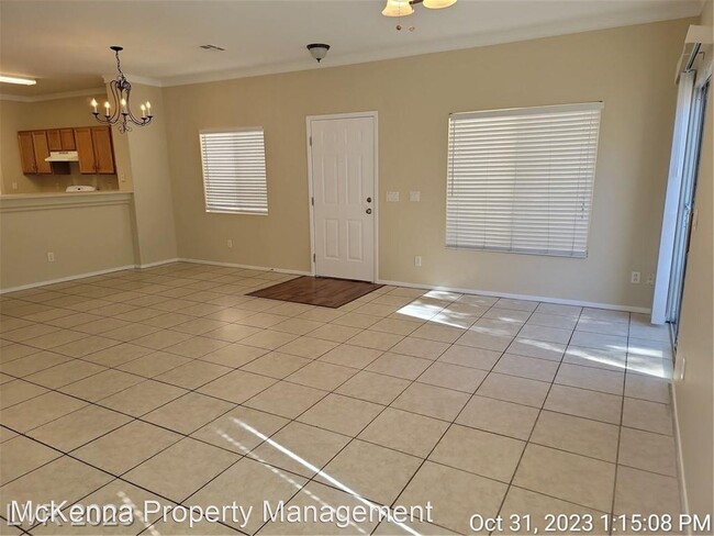 Building Photo - 3 br, 2.5 bath House - 6463 Saddle Up Ave ...