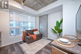 Building Photo - 211-50211 Besserer St
