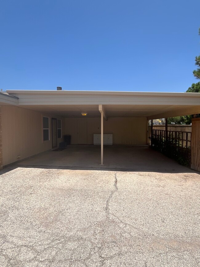 2 car carport with storage room - 6160 Denis Ln