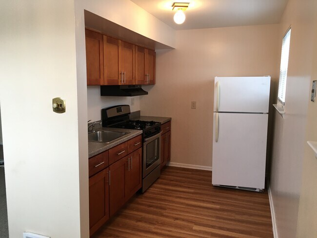 Includes refrigerator - 10620 Evans St