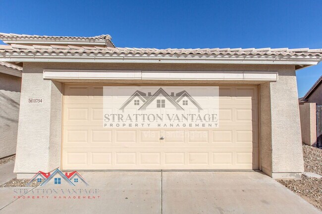 Foto del edificio - 11754 W Belmont Dr