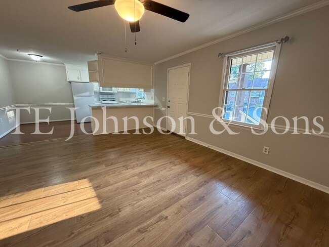 Building Photo - Charming 2-Bedroom with Fireplace & Modern...